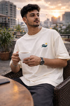 Move Daily Unisex Oversized T-Shirt – Minimal Leaf Icon Design | Off-White