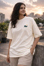 Move Daily Unisex Oversized T-Shirt – Minimal Leaf Icon Design | Off-White